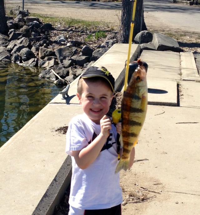 Young Boy with Large Fish